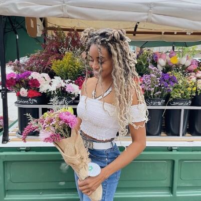 Model Image Holding Flowers